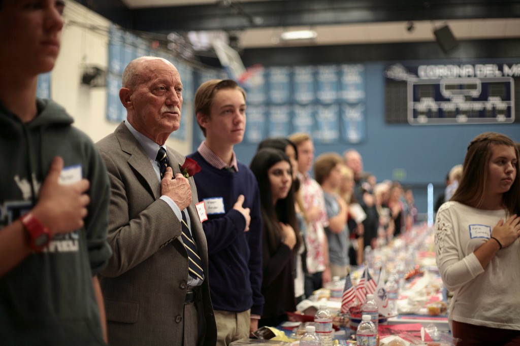 Veterans and students during the National Anthem.