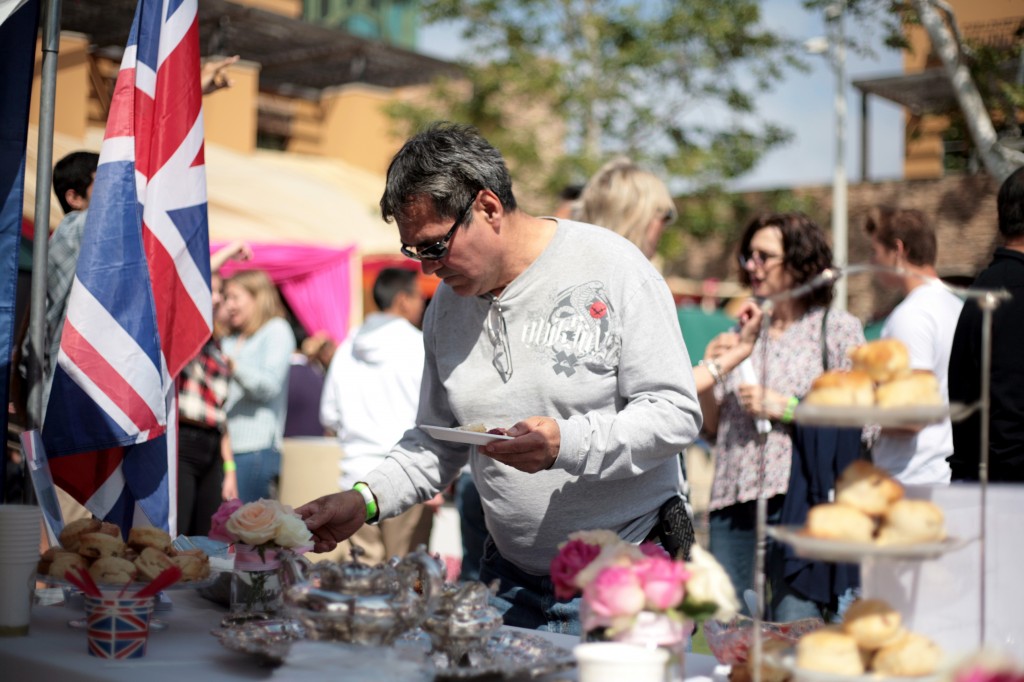 First time fair attendee Jose Hernandez of Riverside, originally from Argentina, picks out one of the homemade British scones. 