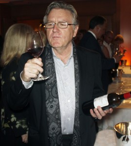 Chef Pascal Olhats savors a French Bordeaux