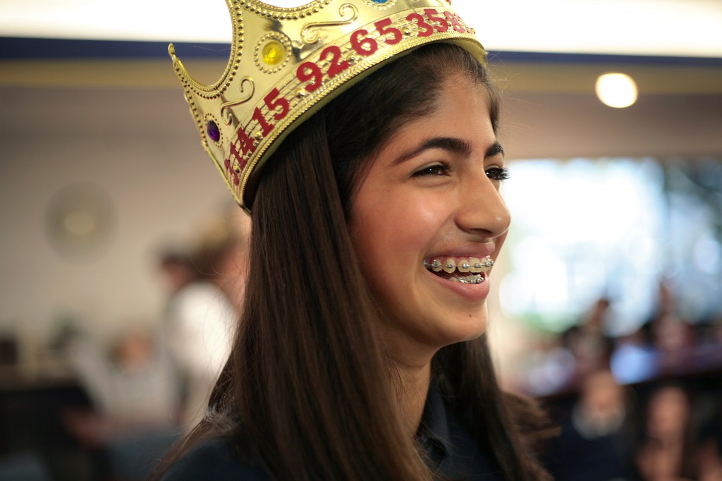 Karina Grover, 12, a sixth grader at Harbor Day School smiles after reciting 3,000 digits of pi and being crowned Pi Queen on campus on March 14, National Pi Day. — All photos by Sara Hall