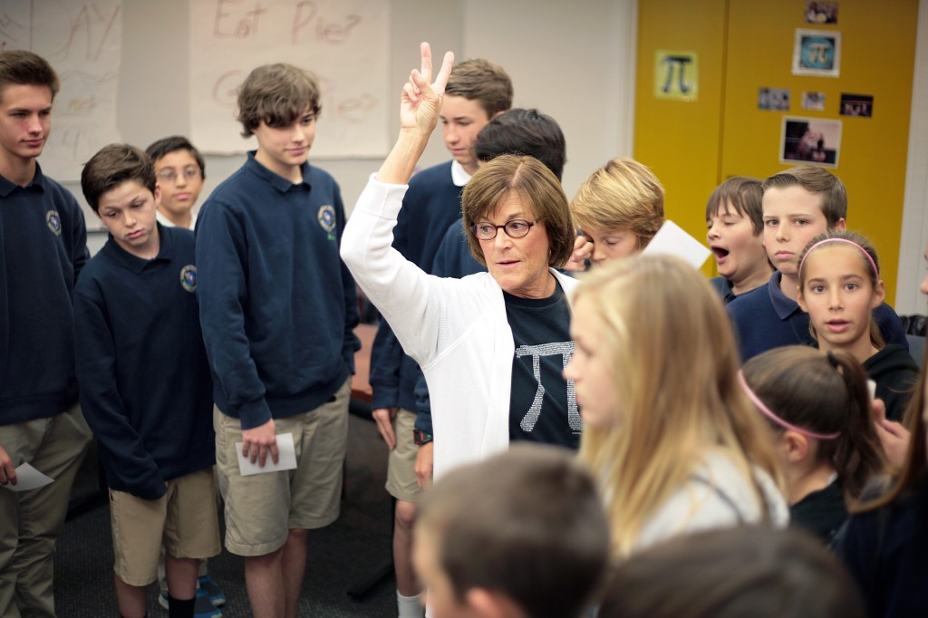 Harbor Day School math teacher Meggen Stockstill leads students in a walk around the pi shrine on March 14, National Pi Day..