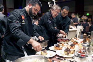 Chef Pascal Olhats (center) and his culinary team