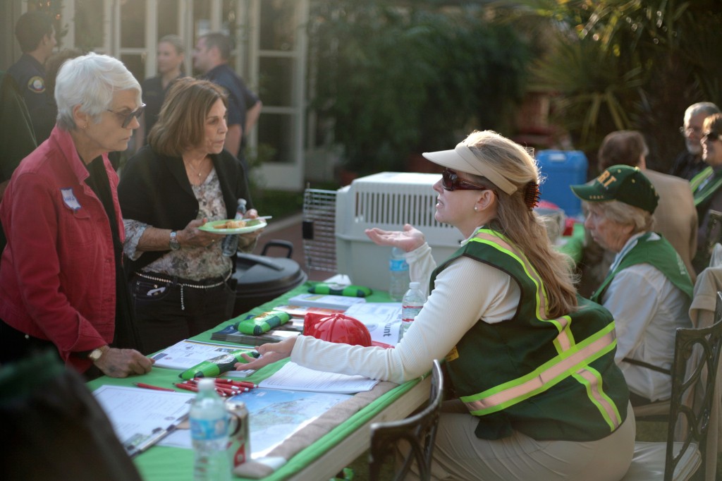 Community Emergency Response Team volunteers talk with CdM residents during the expo.