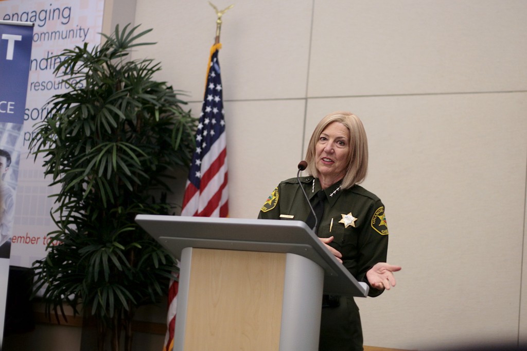 Orange County Sheriff Sandra Hutchens speaks at the Chamber of Commerce’s monthly Wake Up! Newport meeting on Thursday. — Photo by Sara Hall