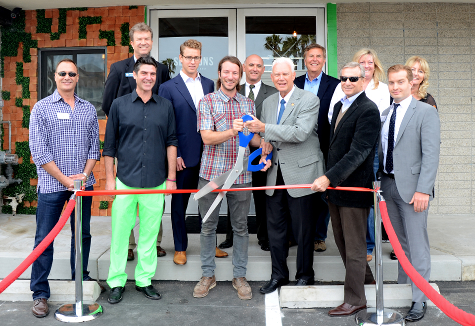 Front row: Newport Beach Lifestyle Publisher and Newport Beach Chamber of Commerce Ambassador Randy Harding, Sessions Sandwiches Co-Owners Max Schlutz and Matt Meddock, Newport Beach Mayor Rush Hill, Newport Beach City Council Member Michael Henn and Newport Beach Harbor Commissioner Joseph Stapleton; Back row: 74th Assembly District Field Representative Scott Peotter, Sessions Co-Owner Beckham Thomas, Newport Chamber of Commerce CEO Steve Rosansky, Burr White Realty Owner Craig Batley, PNC Mortgage Loan Officer and Newport Beach Chamber of Commerce Ambassador Sheila McCarthy and Newport Beach Chamber of Commerce Membership Services Director Pam Blasiar-Smith.