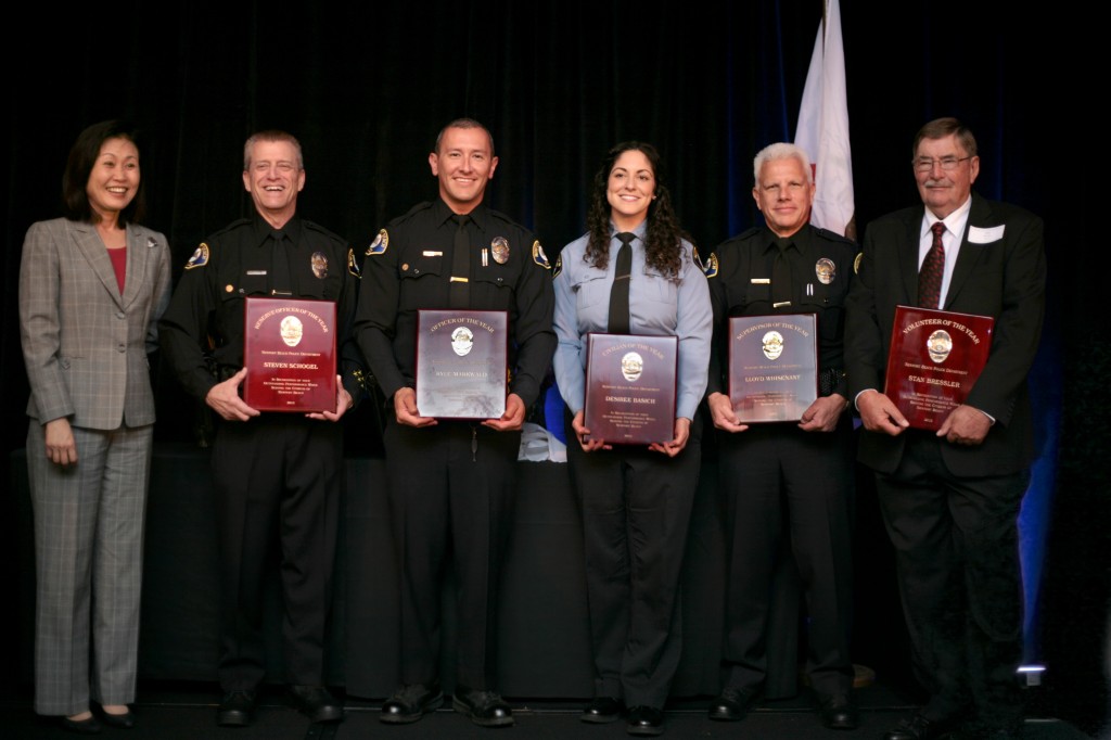 (left to right) Reserve Officer of the Year Steven Schogel, Officer of the Year Kyle Markwald, Civilian of the Year Desiree Basich, Supervisor of the Year Lloyd Whisenant, and Volunteer of the Year Stan Bressler. — Photo by Sara Hall 