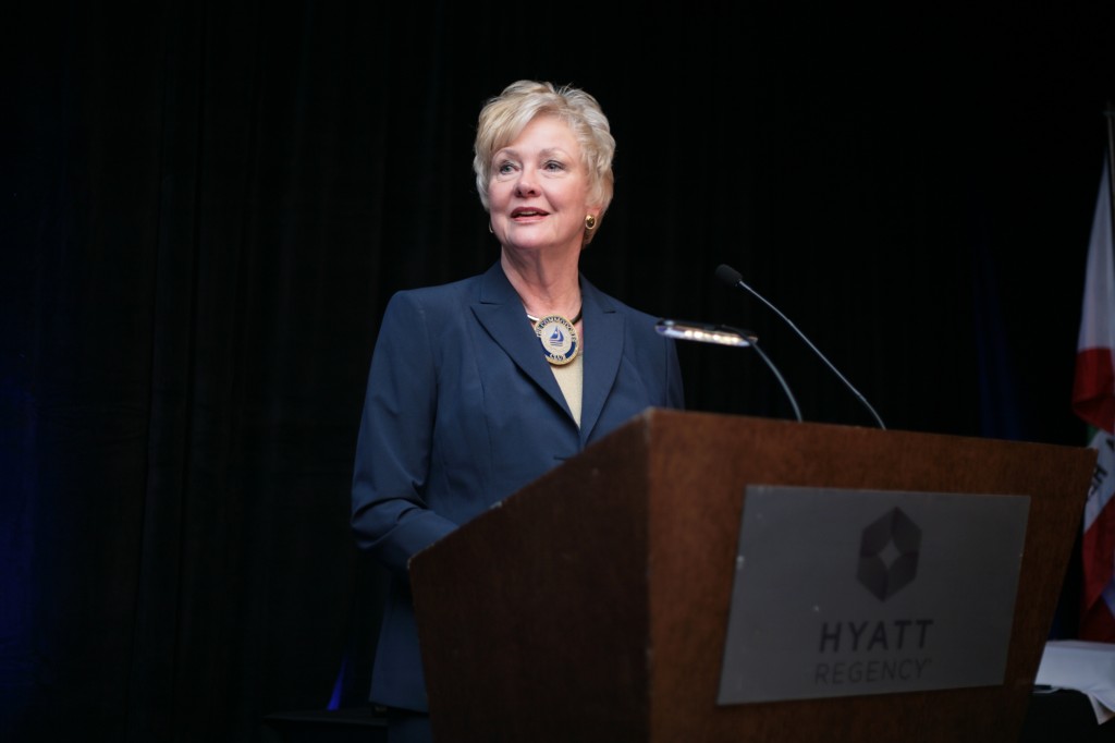 Event chair Carol McDermott gives welcoming remarks. — Photo by Sara Hall