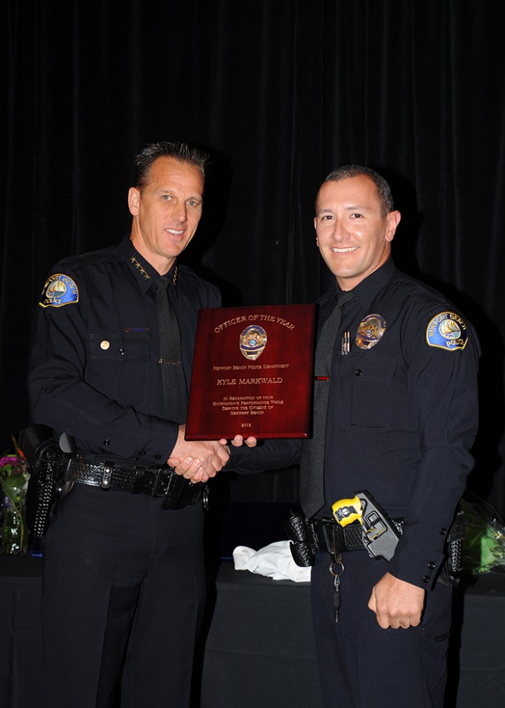 Chief Jay Johnson with Officer of the Year Kyle Markwald — Photo by Don Gage