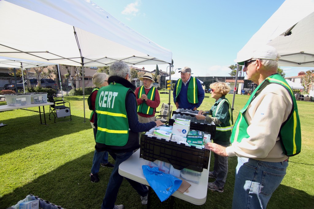 The Lido Isle CERT medical team discuss ideas during the drill.