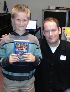 Under Cover columnist Edie Crabtree’s son, Luke Crabtree, with Brandon Mull, author of "The Candy Shop War."