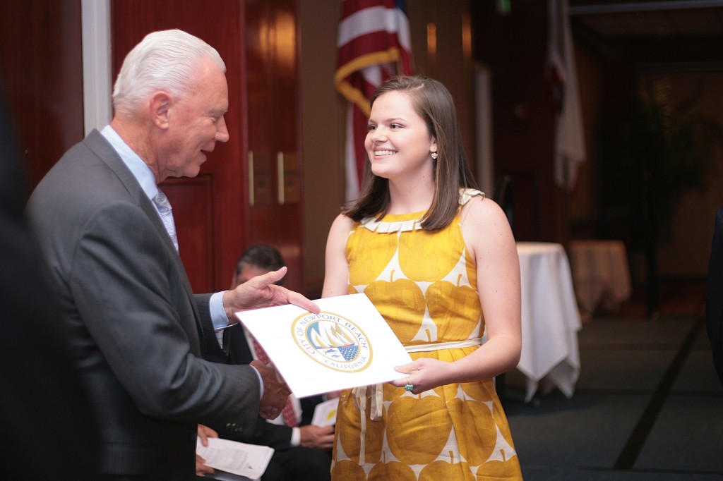 Mayor Rush Hill congratulates Sage Hill School senior Erika Lynn-Green during the ceremony. Lynn-Green said her most memorable moment at Sage was the long hours working on the student newspaper. She plans on studying molecular biology and English at Yale University. — Photo by Sara Hall