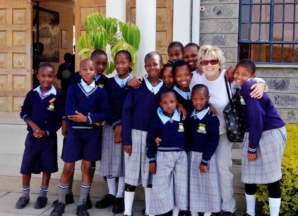 Kenyan kids with Cradle to Career executive director Jene Meece. — Photo courtesy Jene Meece ©