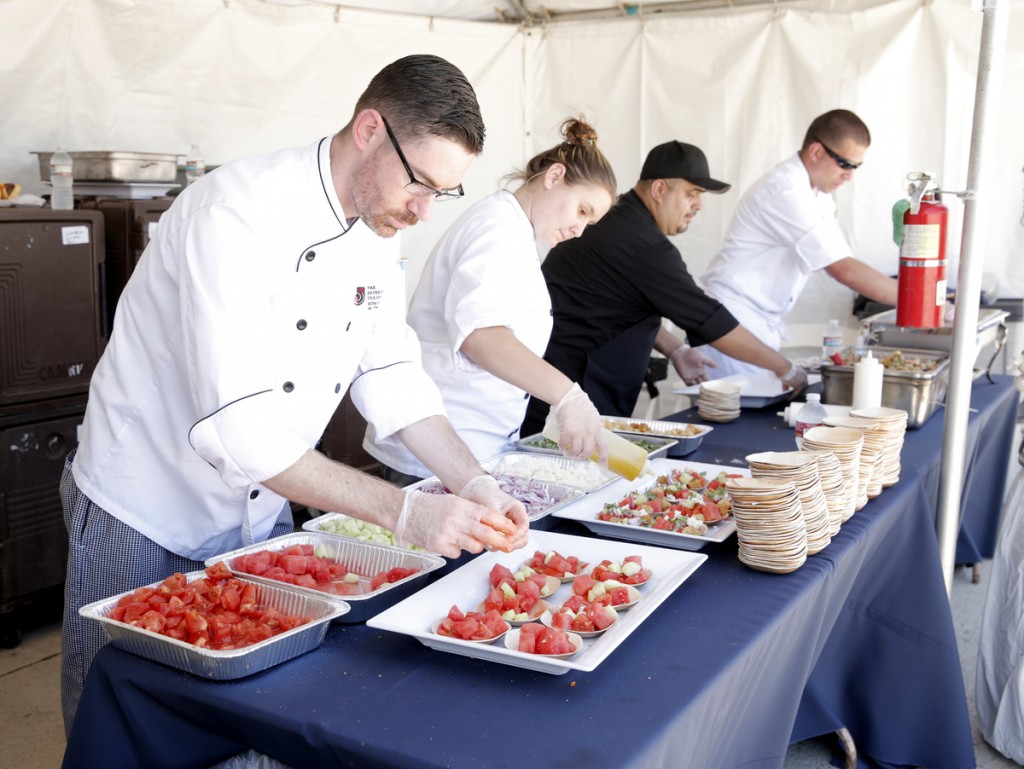 The Art Institute student chefs prepare and serve tastes of their menu