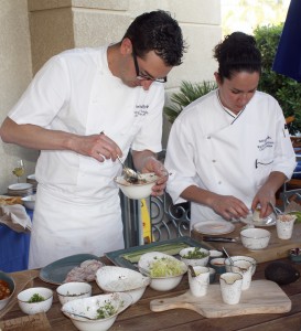 Executive Chef Vincent Lesage and Chef de Cuisine Rachel Haggstrom prepare menu samples.