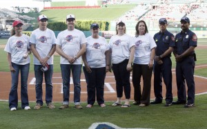 Michelle Wulfestieg (left) and Hoag staff and doctors pose for a pre-game photo at Angel’s Stadium