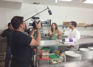 Carrie Williams films a segment of “Dine Newport Beach.”