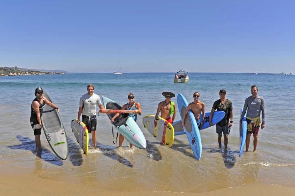 Newport Beach Lifeguards participate in relay paddle for John Wayne Cancer Foundation. — Photo by Lawrence Sherwin ©