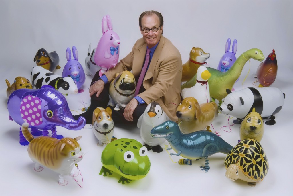 Treb Heining and an array of animal balloons. — Photo courtesy Treb Heining ©