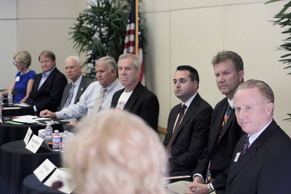 City council candidates listen as a question is posed to them. — Photo by Sara Hall ©