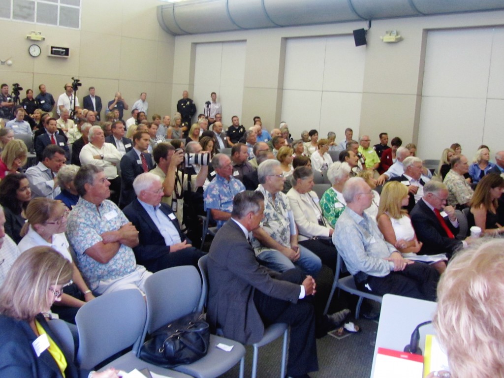 A packed house listens to the city council candidates. — Photo by Sara Hall ©