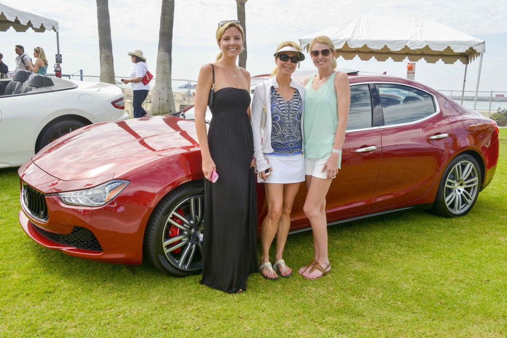 Ladies with Maserati sedan