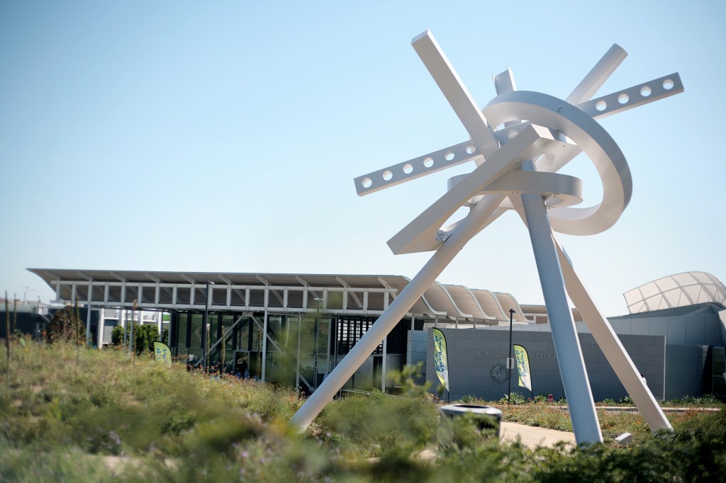 Ray Katz’s Odyssey sculpture looms over the Civic Center during the grand opening of the exhibition at the Civic Center Park on Saturday. — Photo by Sara Hall ©