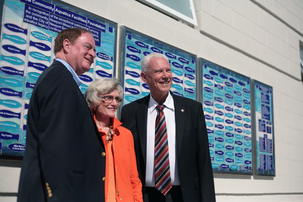 (left to right) Newport Beach City Councilman Keith Curry, former Assemblywoman and California State Senator Marian Bergeson, and NB Mayor Rush Hill pose for photos in front of the commemorative wall on Tuesday. — Photo by Sara Hall ©