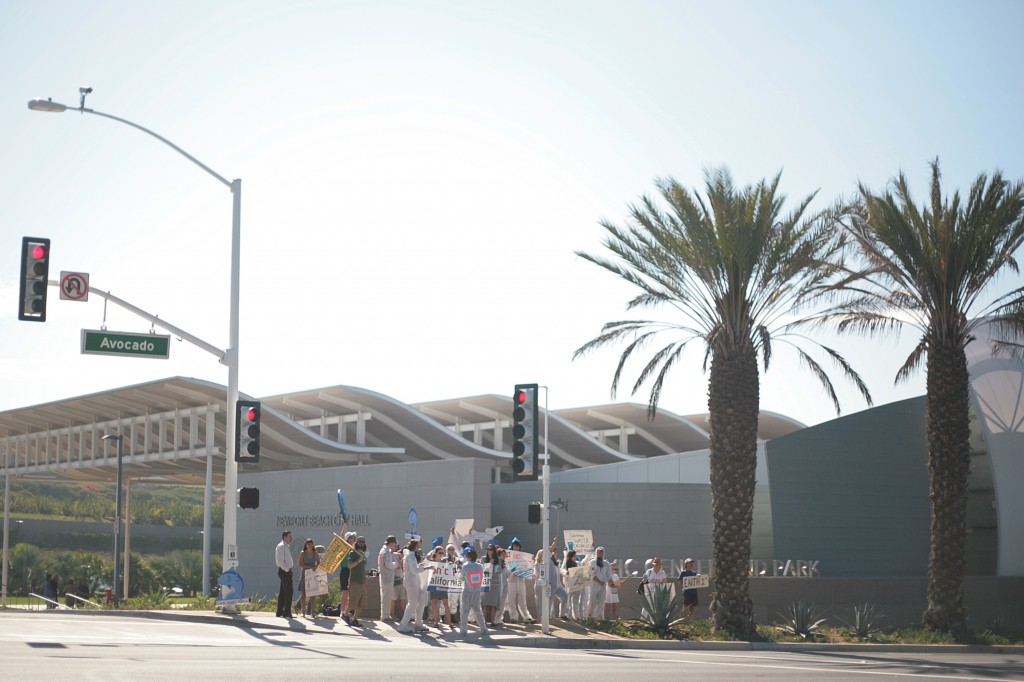 A group of about two dozen protested fracking during a CC meeting Wednesday on the street just outside council chambers. — Photo by Sara Hall ©