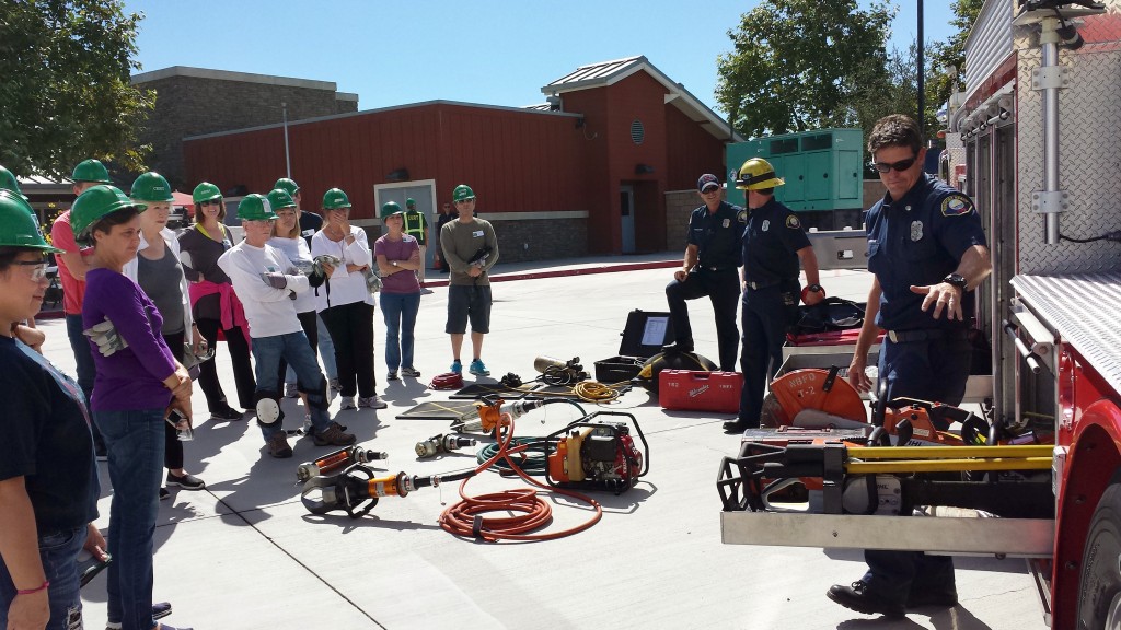 NBFD Fire Captain Brian McDonough talks about the equipment they carry on the fire truck during a CERT training class in early October. — Photo by Sara Hall ©