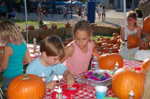 Pumpkin decorating was one of the more popular attractions at the MCS Fall Festival. — Photo by Debra Biagiotti ©