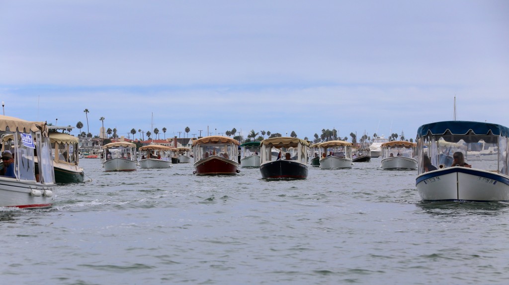 Duffy boats parading in Newport Harbor