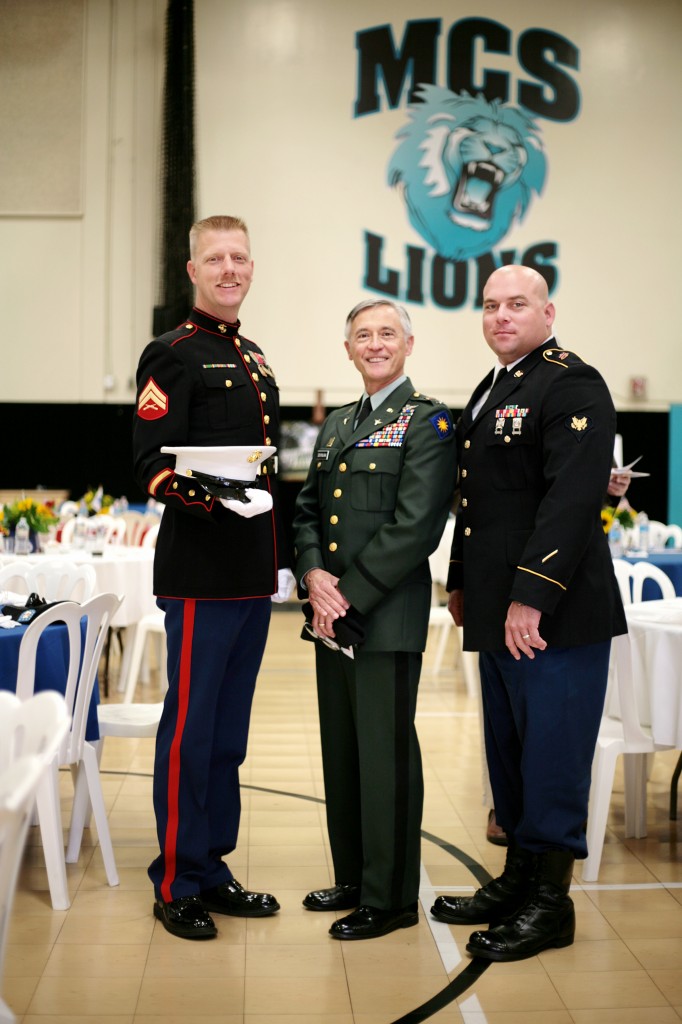(left to right) Dwight Hanson, U.S. Marine Corps retired and MCS Boy Scouts, Mirko Duvnjak, Military Reserve Technician for the National Guard, and Steven Padilla, Marine veteran who served in Operation Iraqi Freedom, pose for a photo together during the event.  — Photo by Sara Hall