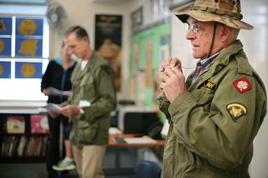 Brothers-in-law and Vietnam veterans (left) Mike Flenniken and Mike Dowd talk to a class at Mariners Elementary School about their experiences during the war.
