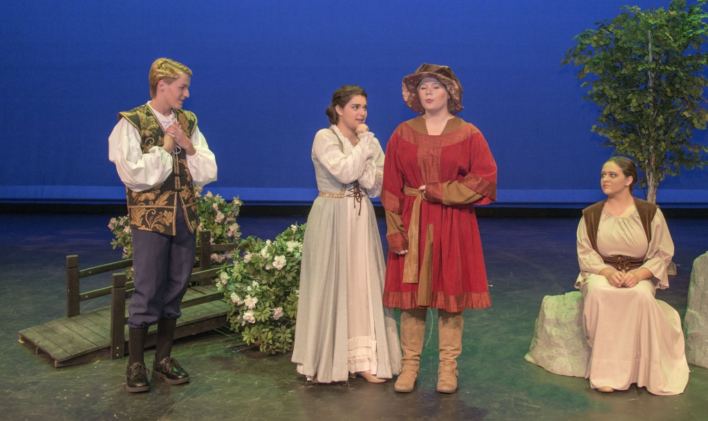 (left to right) Sophomore Chris Surridge, juniors Vita Muccia and Kaylee Call, all 16, and sophomore Serafina Busa, 15, perform a scene from As You Like It." — Photo by Charles Weinberg