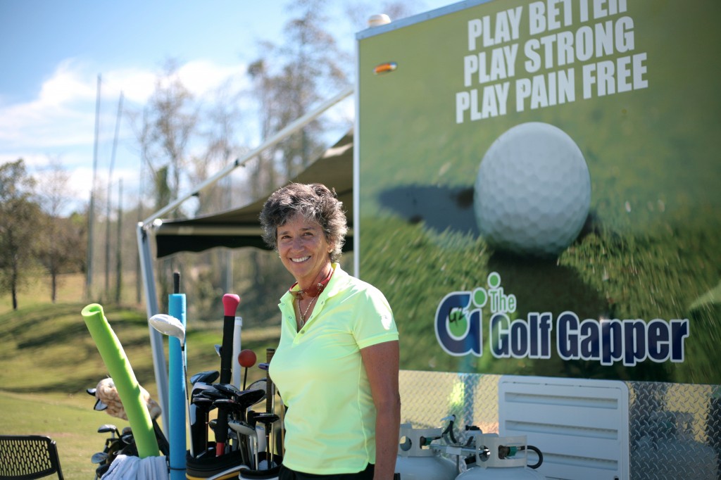 Jenni Martin with her Golf Gapper trailer.  — Photo by Sara Hall