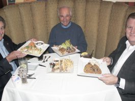 Mayor Ed Selich, Bungalow co-owner Jim Walker, Newport Beach & Co. President and CEO Gary Sherwin, discussing Restaurant Week