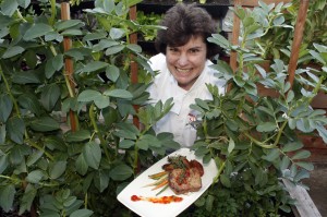 Chef Cathy Pavlos of Provenance Restaurant, pictured in her herb garden, wants diners to Seize the Dish during Newport Beach Restaurant Week