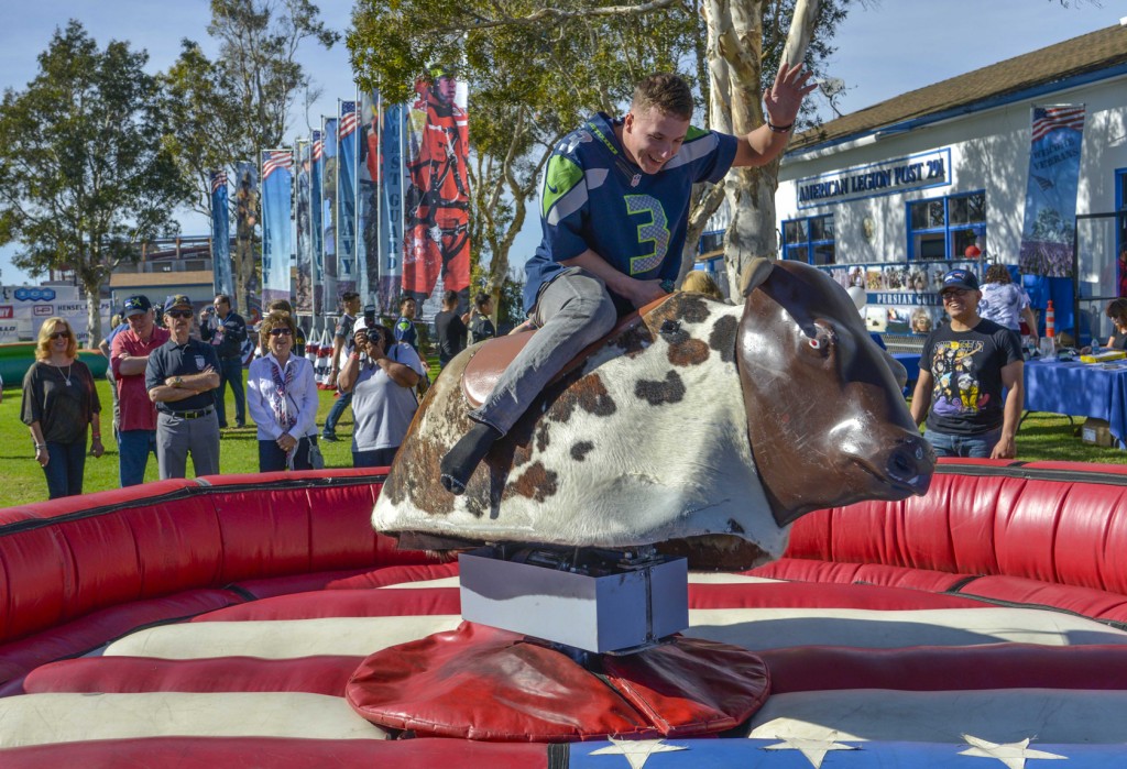 Marine riding bull at Super Bowl event