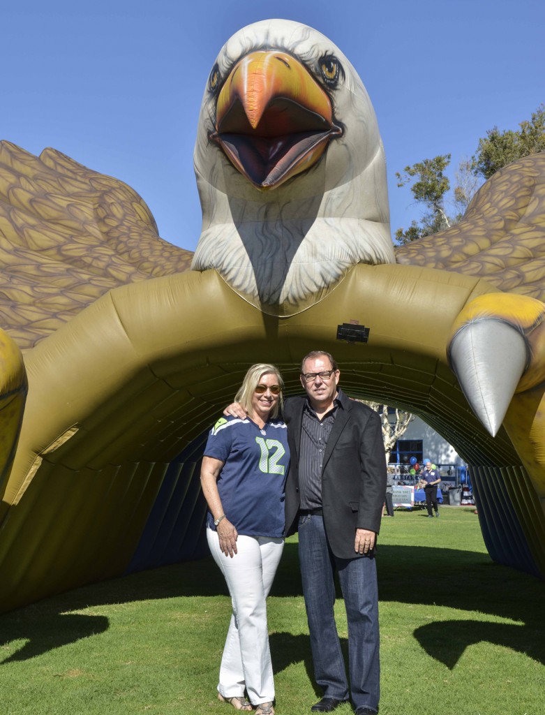 Hosts Julie and Gary Crisp at the Super Bowl event