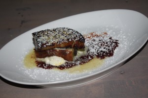 Seared foie gras atop pain perdu with smoked cherry jus