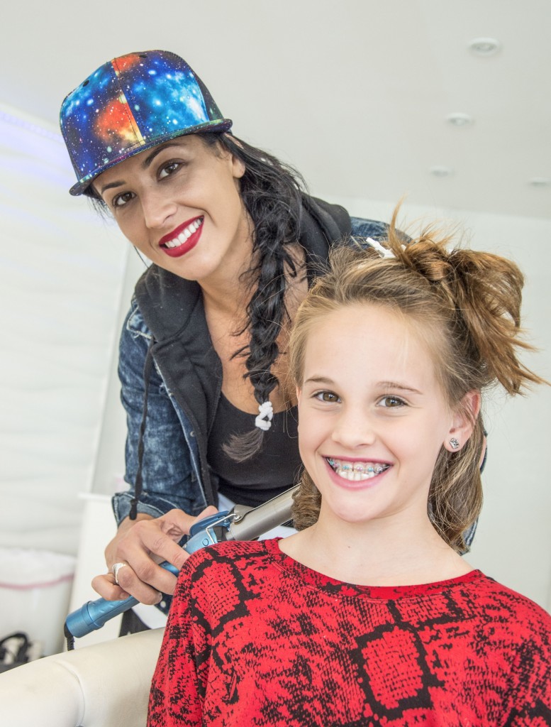 A special screening of the movie “Cinderella” at Big Newport 6 theater, sponsored by Social Dry Lounge and B Candy of Corona del Mar, brought out hundreds of local children dressed in their Cinderella best. — Photo by Lawrence Sherwin ©