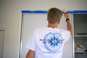 NLYM member Blake Richter, 15, works on a room at the Human Options housing facility during the refurbishing project.