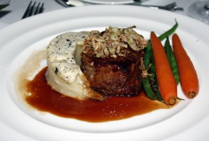 pan-roasted filet of beef served with custard potatoes, port wine sauce, leeks and truffles