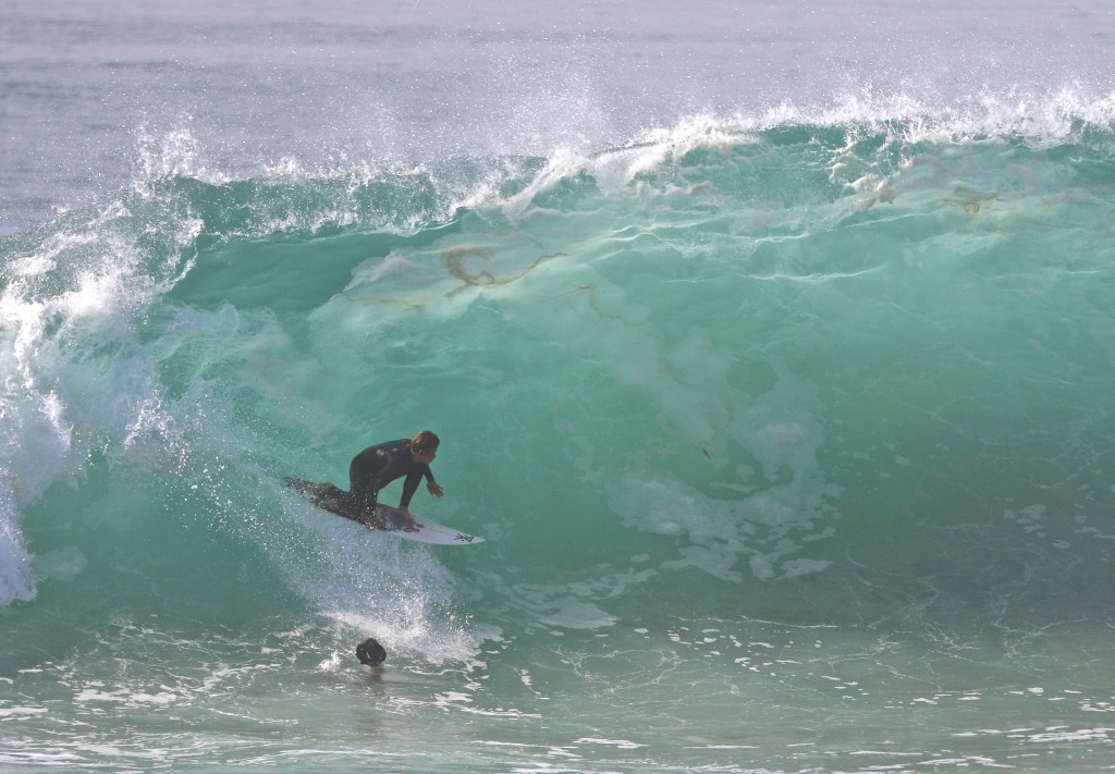 Surfing the Wedge. — Photo by Jim Collins © 