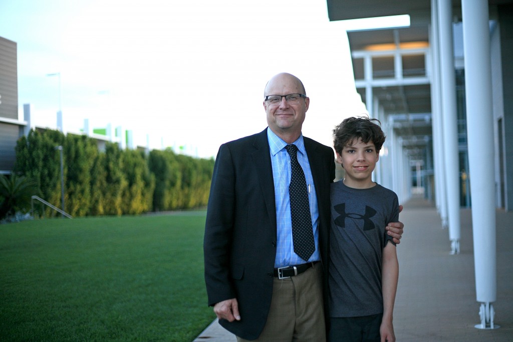 Stephen Camarata, Ph.D., an expert on late-talking children, and Jack Lessley, whose mother organized a lecture on the topic by Camarata in Newport Beach on March 14. Camarata has been working with Lessley since he was 3 years old.   — Photo by Sara Hall ©