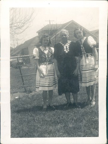 Bernadette Senn's mother (left), grandmother (center) and aunt wearing traditional Polish outfits.  — Photo courtesy Bernadette Senn ©