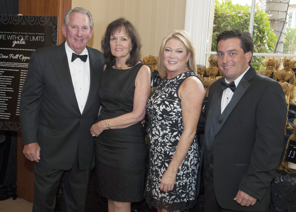 Honorees Chris, Kathy and Brain Dubia with UCP-OC CEO Deborah Levy at the United Cerebral Palsy of Orange County-Life Without Limits Gala. — Photo courtesy of United Cerebral Palsy of Orange County ©