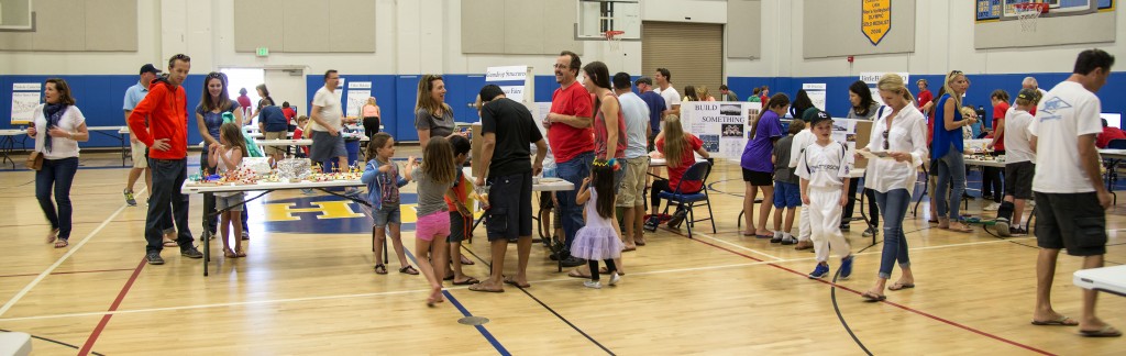 Kids and parents check out projects at the Harbor Day School Maker Faire on April 18. — Photo by Charles Weinberg