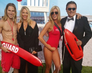 Dr. Shelly Zavala and Christopher Trela pose with Baywatch models 