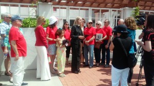 Rev. Canon Cindy Evans Voorhees (center) of the St. James the Great Episcopal Church at the press conference 